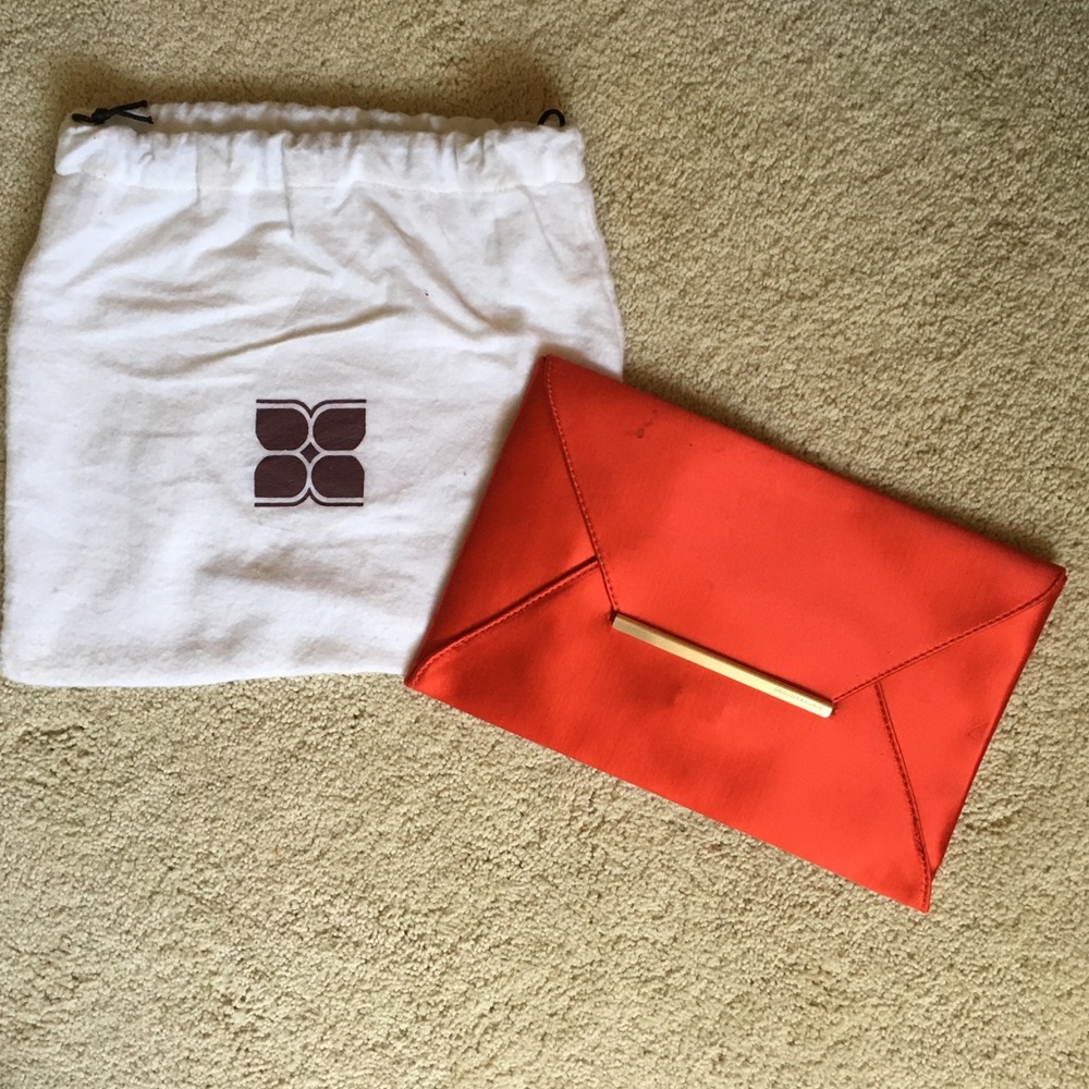 BCBG Envelope clutch (never worn)